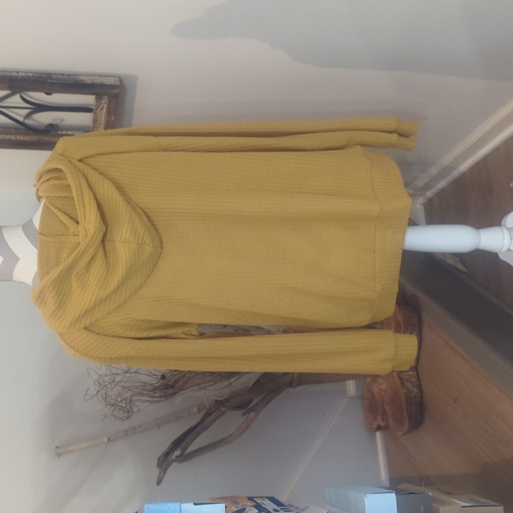 Lightweight Lulu waffled knit hooded oversized top.